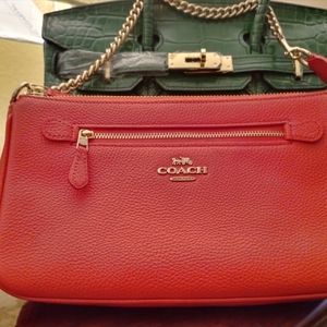 Orange authentic coach bag large wristlet gold chain gold hardware brand new